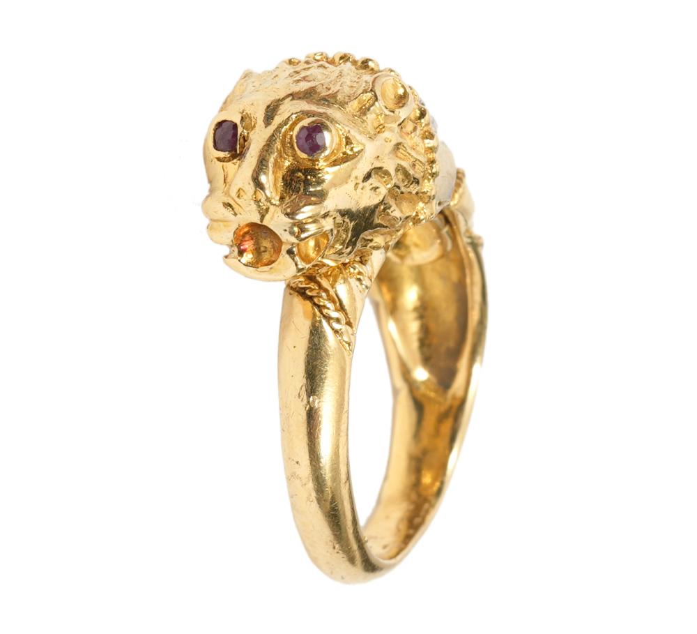 Appraisal: K yellow gold diamond ruby cheetah ring highlighting a carved