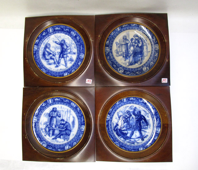 Appraisal: FOUR FRAMED WEDGWOOD FLOW BLUE DINNER PLATES Ivanhoe pattern plate