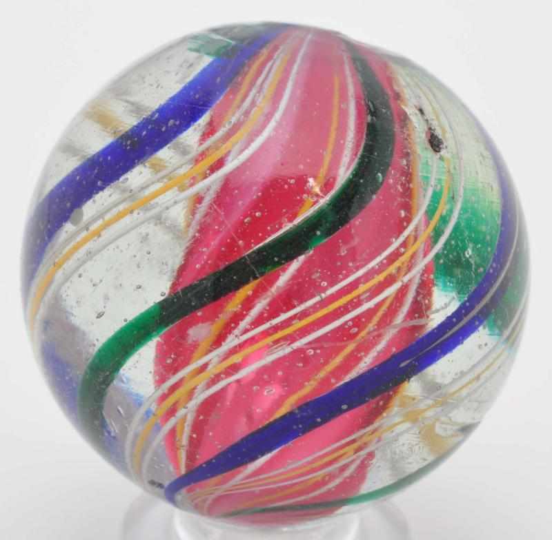 Appraisal: Pink Solid Core Swirl Marble Description Slight opening to core