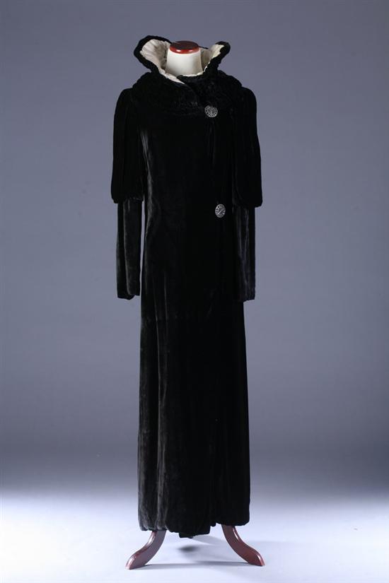 Appraisal: FRENCH PAUL POIRET-STYLE BLACK VELVET OPERA COAT Circa Ankle-length high-neck