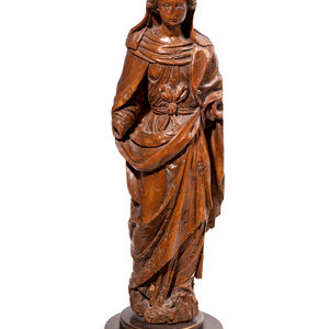 Appraisal: A Continental Carved Walnut Figure of the Virgin Mary th