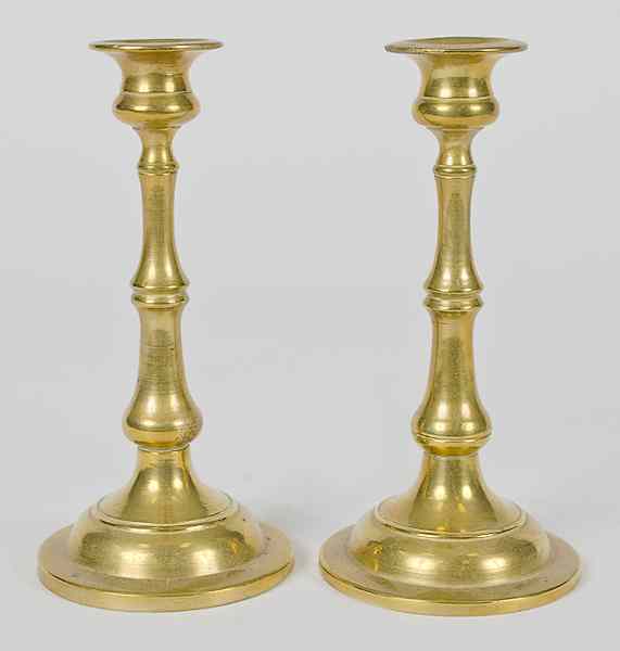 Appraisal: English Brass Candlesticks English A pair of brass candlesticks on