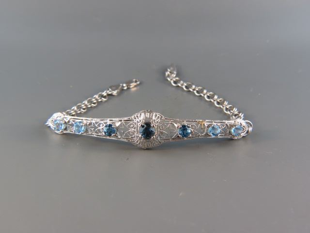 Appraisal: Blue Topaz Bracelet London blue round gems totaling carats in