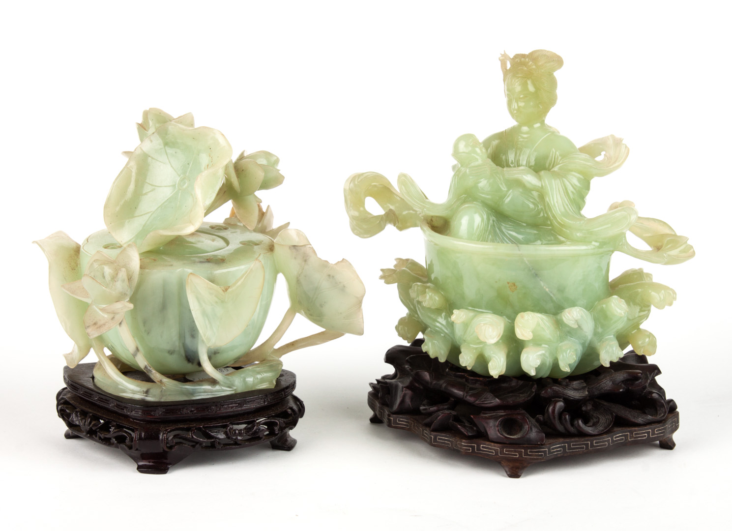 Appraisal: Two Chinese carved jade figural groups Quan-Yin with child on