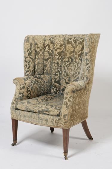 Appraisal: A GEORGE III STYLE WING BACK ARMCHAIR the raised back