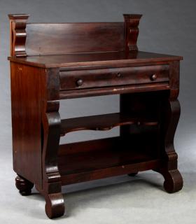 Appraisal: American Classical Carved Mahogany Washstand th c the wide backsplash