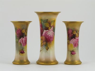 Appraisal: Three Royal Worcester flared cylindrical vases decorated with pink roses