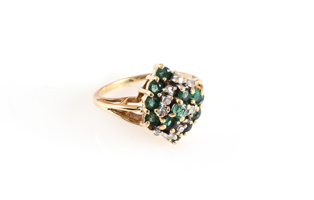 Appraisal: K DIAMOND EMERALD RING K yellow gold ring contains round