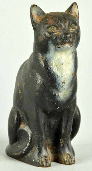 Appraisal: Cast Iron Sitting Cat Doorstop Description Made by cjo Judd