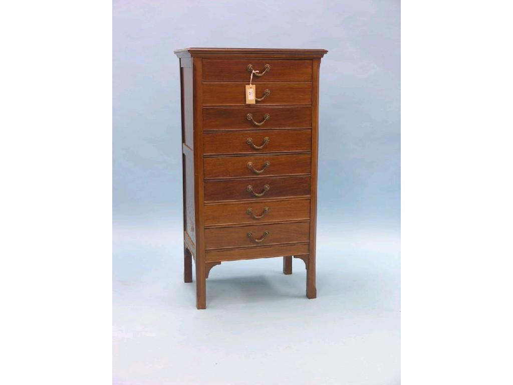 Appraisal: An Edwardian mahogany music chest eight fall-front drawers ft in