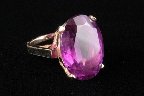 Appraisal: K YELLOW GOLD AND AMETHYST RING Oval amethyst weighing app