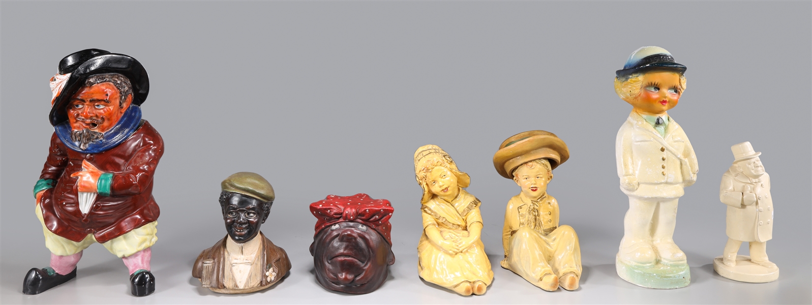 Appraisal: Group of seven various decorative figural form ceramics including figure