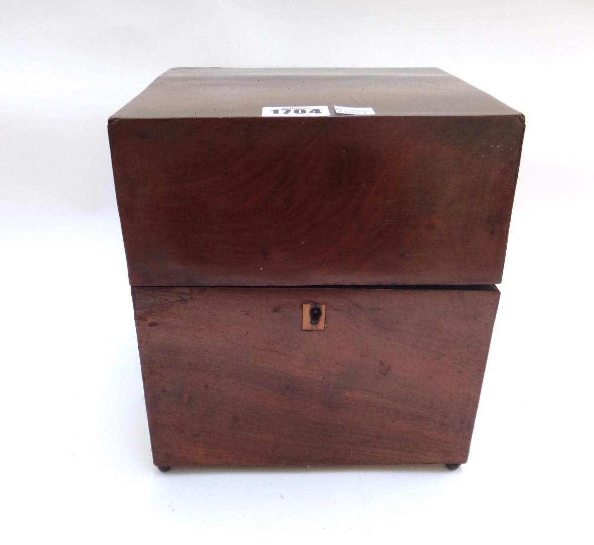 Appraisal: A George III mahogany decanter box the square lift top