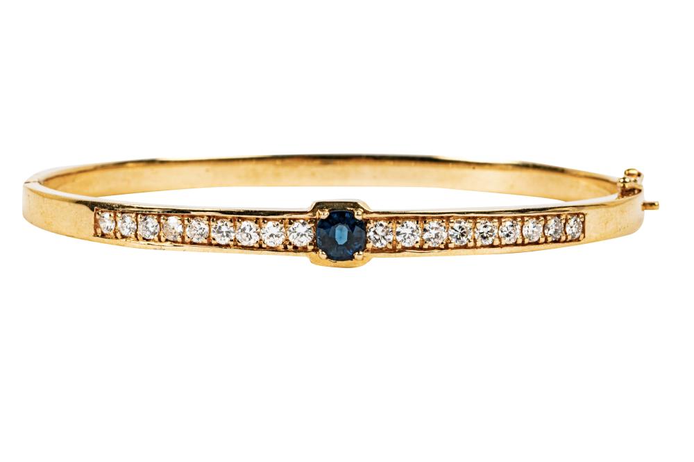 Appraisal: KARAT YELLOW GOLD DIAMOND SAPPHIRE BANGLE BRACELETcentering one oval mixed