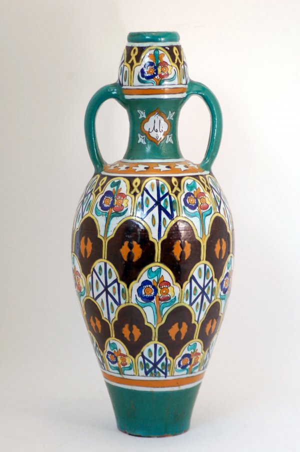 Appraisal: Signed Persian floor vase with geometric designs and two handles