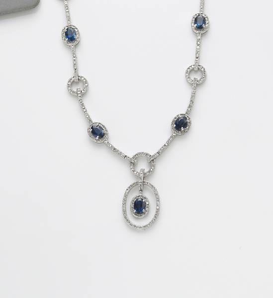 Appraisal: A sapphire diamond and k white gold necklace estimated total