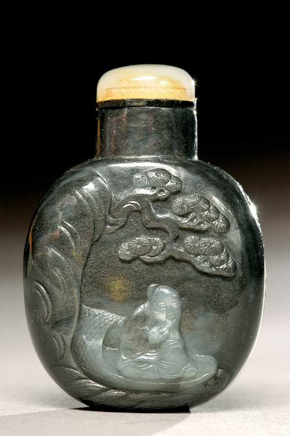 Appraisal: BLACK JADE SNUFF BOTTLE Well hollowed carved black jade snuff