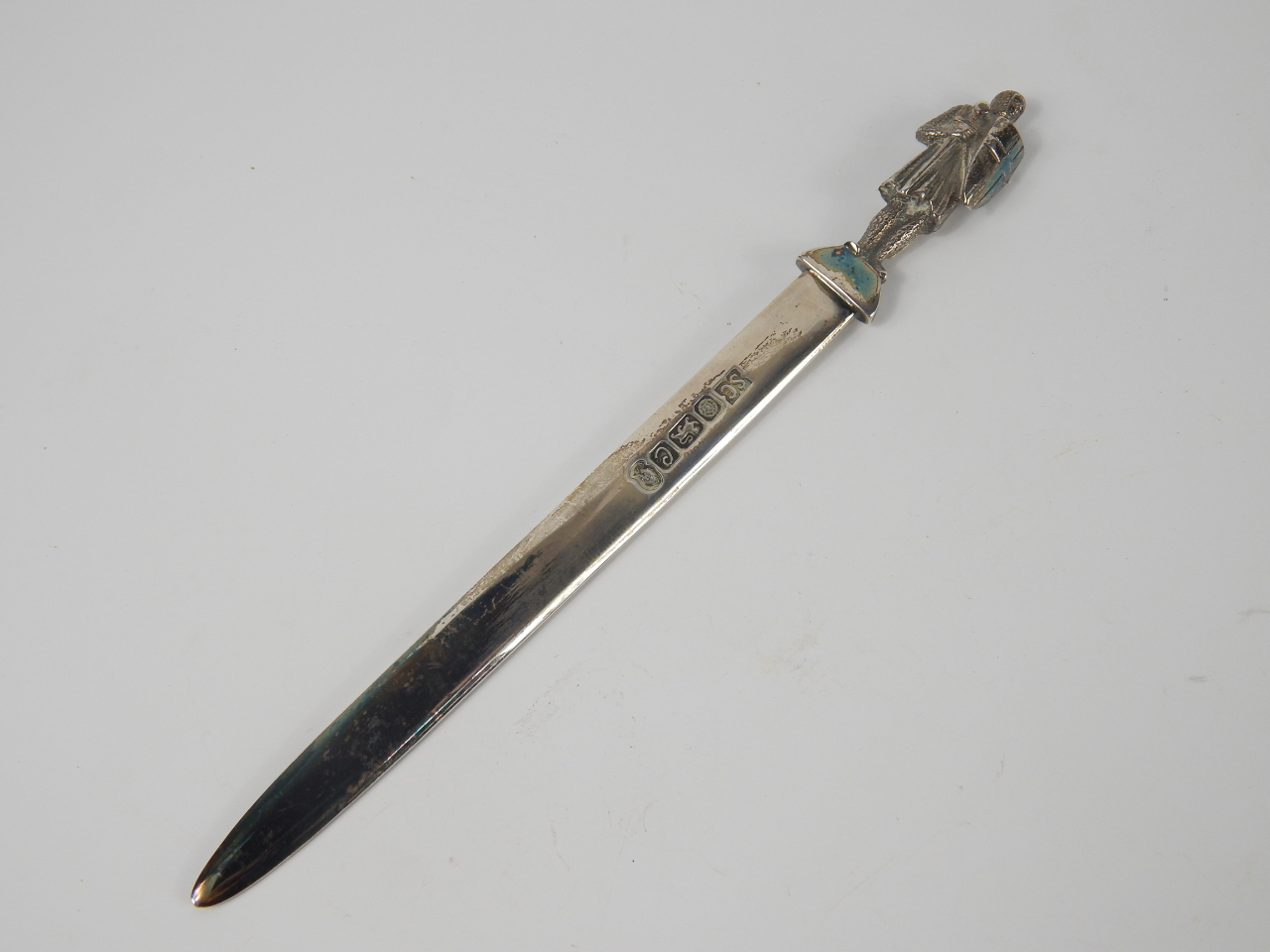 Appraisal: A silver paper knife with a knight crusader handle Sheffield