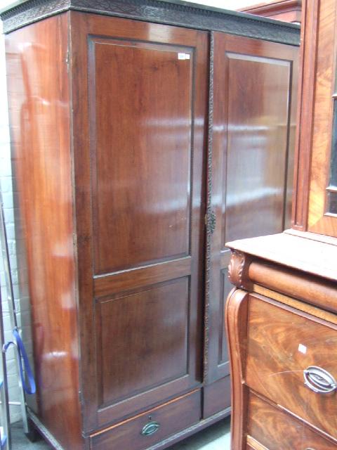 Appraisal: A th century mahogany wardrobe the cornice with blind fret