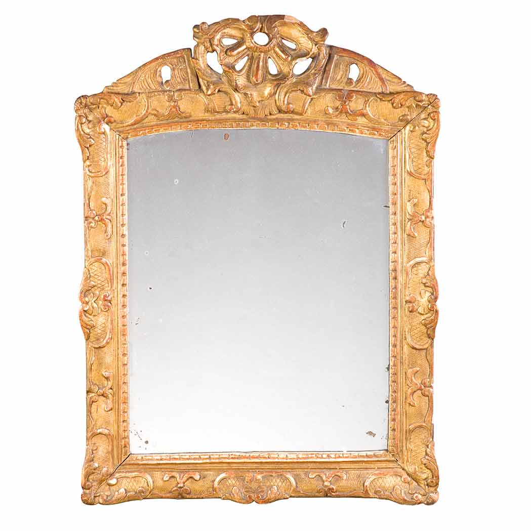 Appraisal: Regence Gilt-Wood Mirror th Century The rectangular mirror plate surmounted