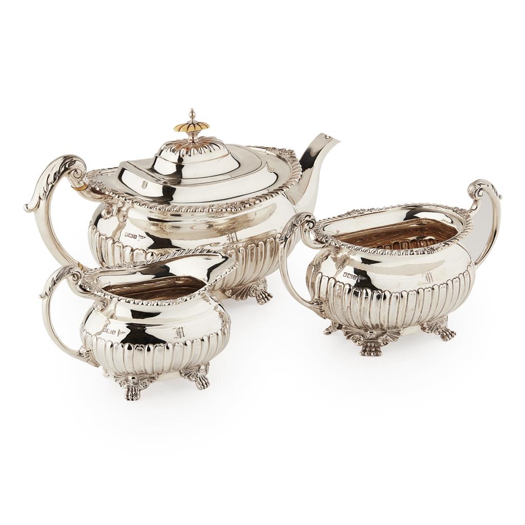 Appraisal: A matched Edwardian three piece tea set Walker Hall Sheffield