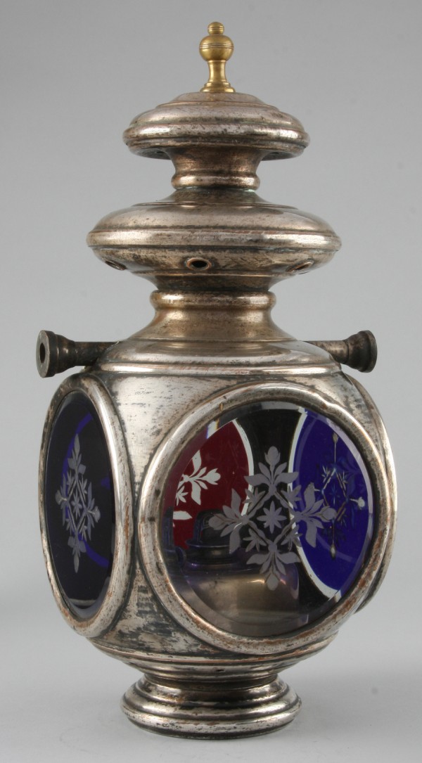 Appraisal: Lamp with ruby and cobalt glass panels which feature floral