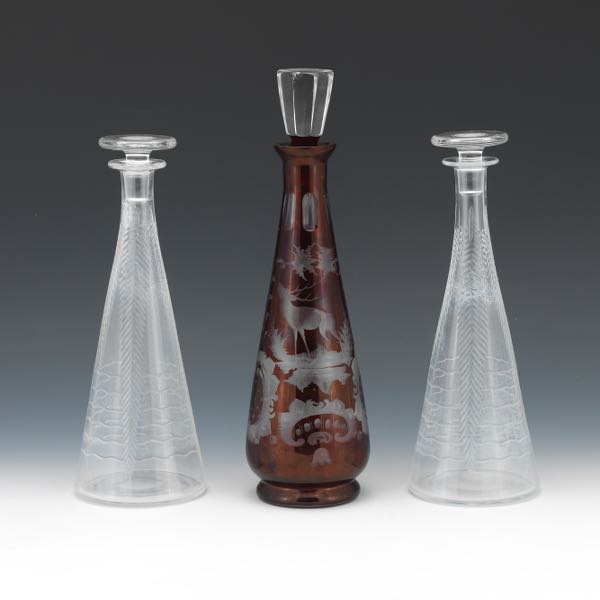 Appraisal: Three Antique Glass Liquor Carafes Consisting of hand blown decanters