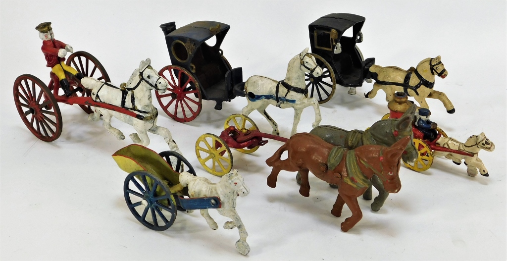 Appraisal: PC AMERICAN CAST IRON HORSE DRAWN CARRIAGE TOYS United States