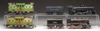 Appraisal: GROUP OF FOUR LIONEL O GAUGE ENGINES TWO TENDERS Includes