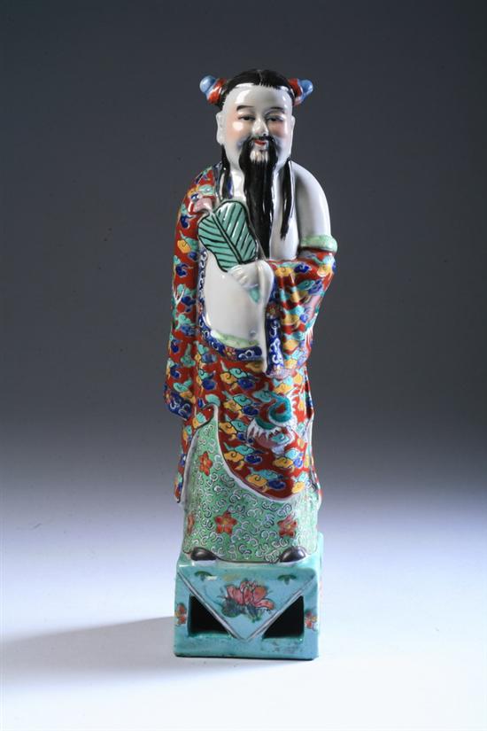 Appraisal: CHINESE FAMILLE ROSE PORCELAIN FIGURE OF IMMORTAL Standing on rectangular