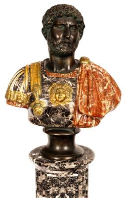 Appraisal: A Roman style bust of an Emperor in patinated metal