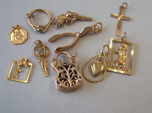 Appraisal: A group of ten pendants and charms including a ct