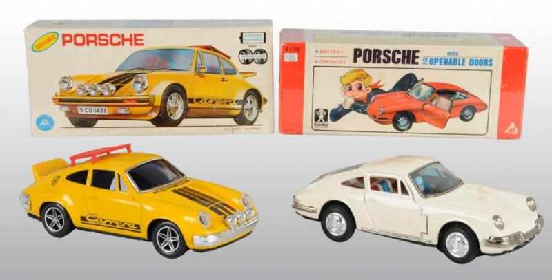 Appraisal: Lot of Tin Porsche Auto Battery-Operated Toys Description Japanese Working