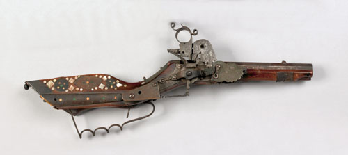 Appraisal: Middle Eastern wheelock pistol with ornate mechanism and mother of