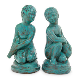 Appraisal: A Pair of Patinated Cast Metal Figures the base marked