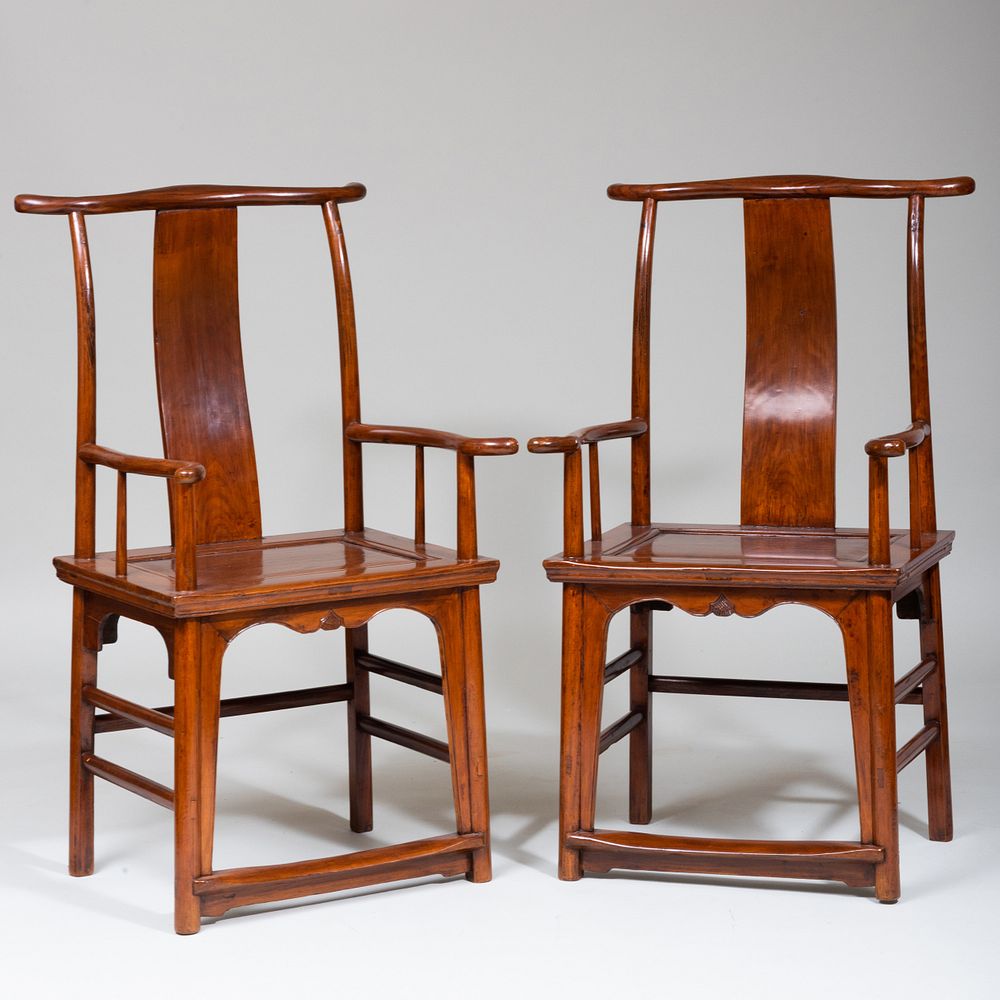 Appraisal: Pair of Chinese Elmwood Yoke-Back Chairs x x in height