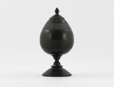 Appraisal: A lignum vitae treen cup and cover with reeded banding