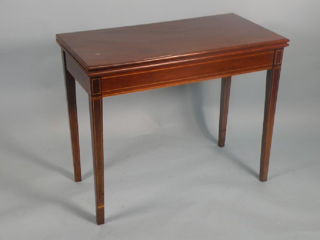 Appraisal: An early thC mahogany tea table on boxwood strung square