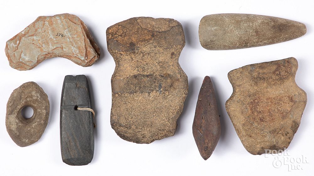 Appraisal: Seven prehistoric stone artifacts Seven prehistoric stone artifacts to include