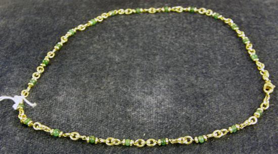 Appraisal: A YELLOW METAL NECKLACE set hardstone beads