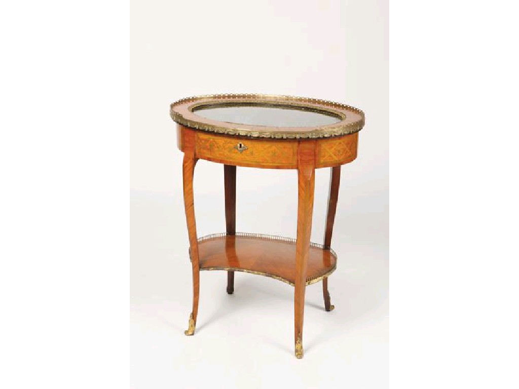 Appraisal: A LOUIS XV STYLE TULIPWOOD AND MARQUETRY BIJOUTERIE TABLE with