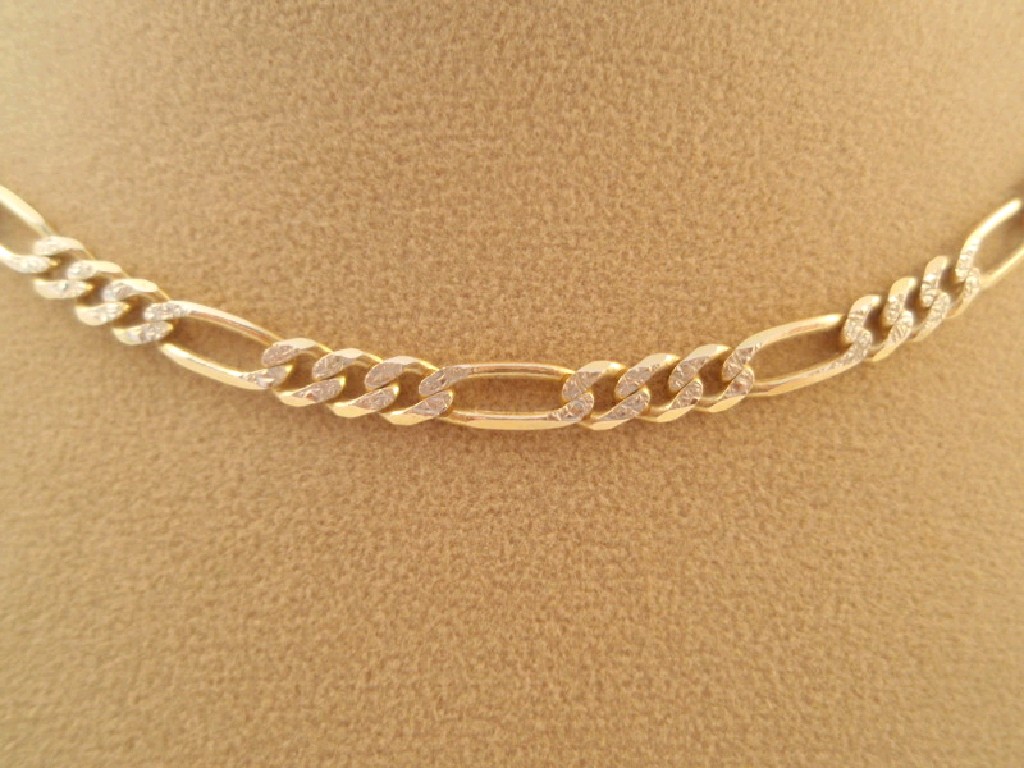 Appraisal: A Figaro chain stamped K g