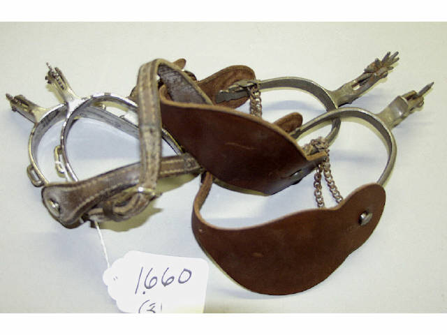 Appraisal: A collection of two pairs of spurs including North and