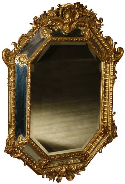 Appraisal: A pair of Baroque style gilt molded composition beveled glass