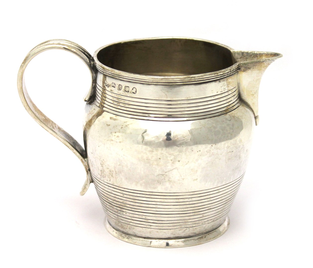 Appraisal: A George III silver milk jug the body decorated with