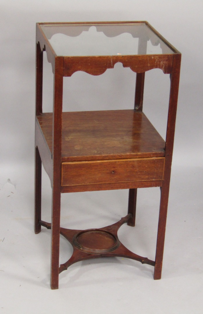 Appraisal: A George III mahogany night table with later replacement glass