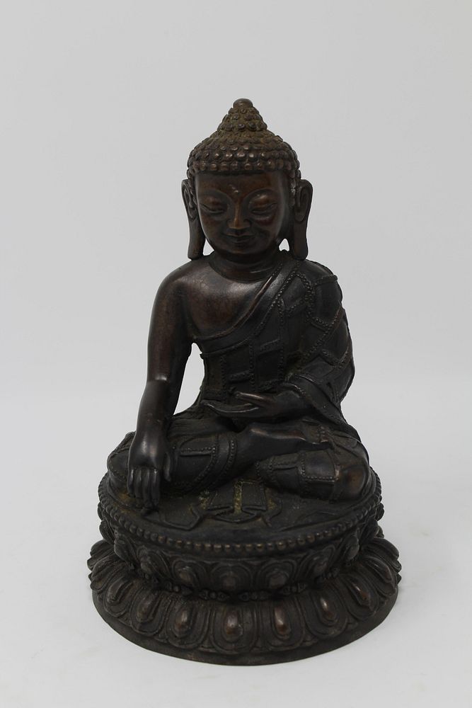 Appraisal: Bronze Seated Southeast Asian Figure Bronze Seated Southeast Asian Figure