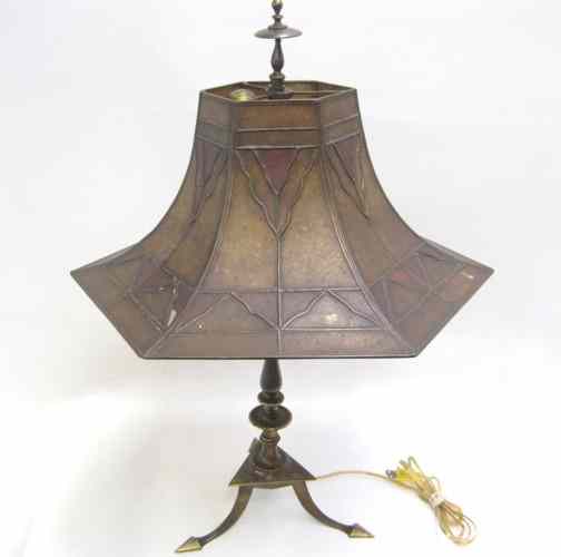 Appraisal: AN AMERICAN ARTS AND CRAFTS TABLE LAMP The tri-footed heavy