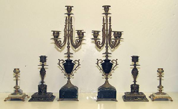 Appraisal: Two pairs of bronze candlesticks and pair of gilt brass