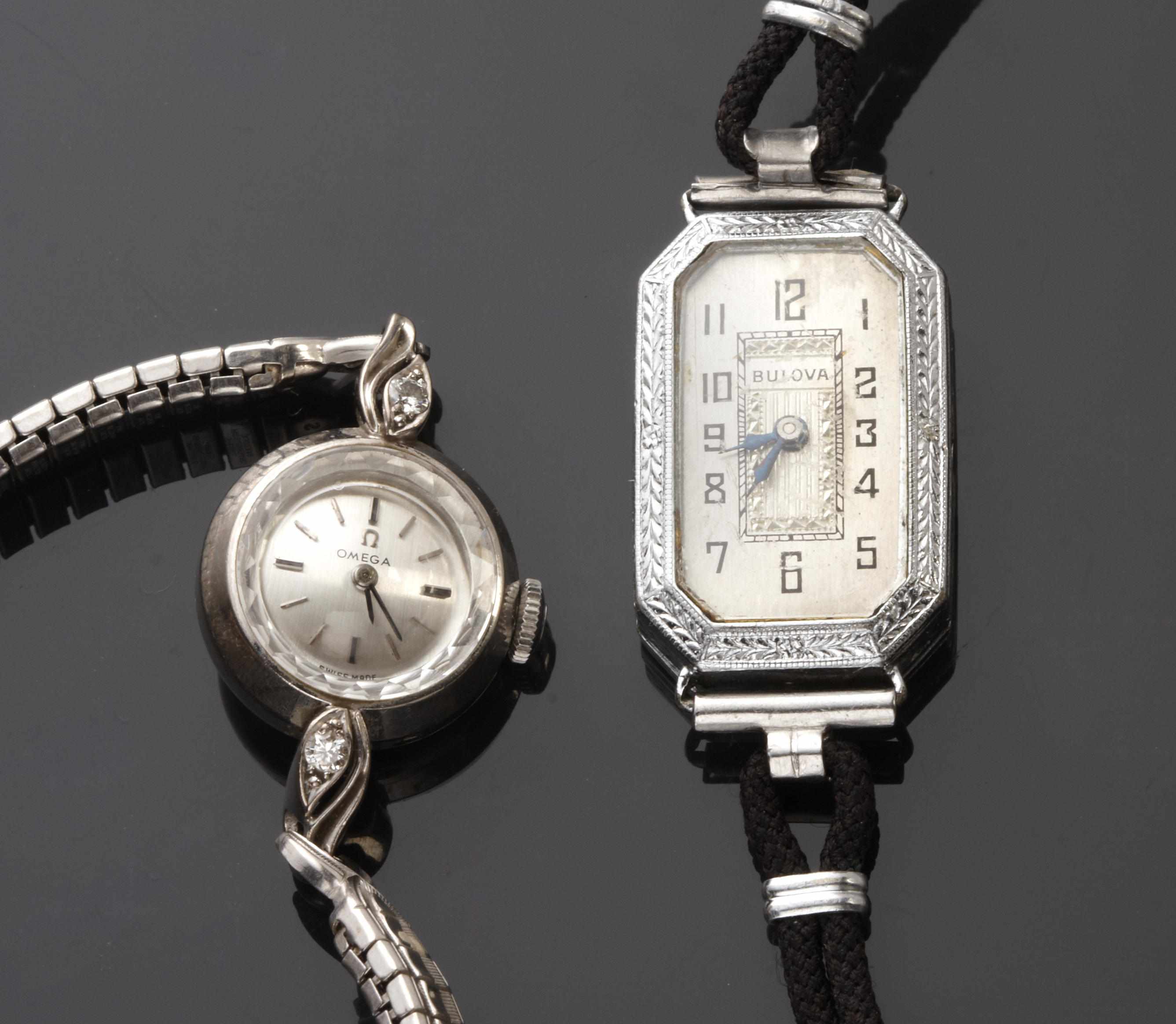 Appraisal: A collection of three gold and metal wristwatches